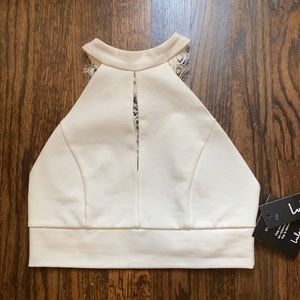 Lulu’s white/ivory crop top with lace back detail